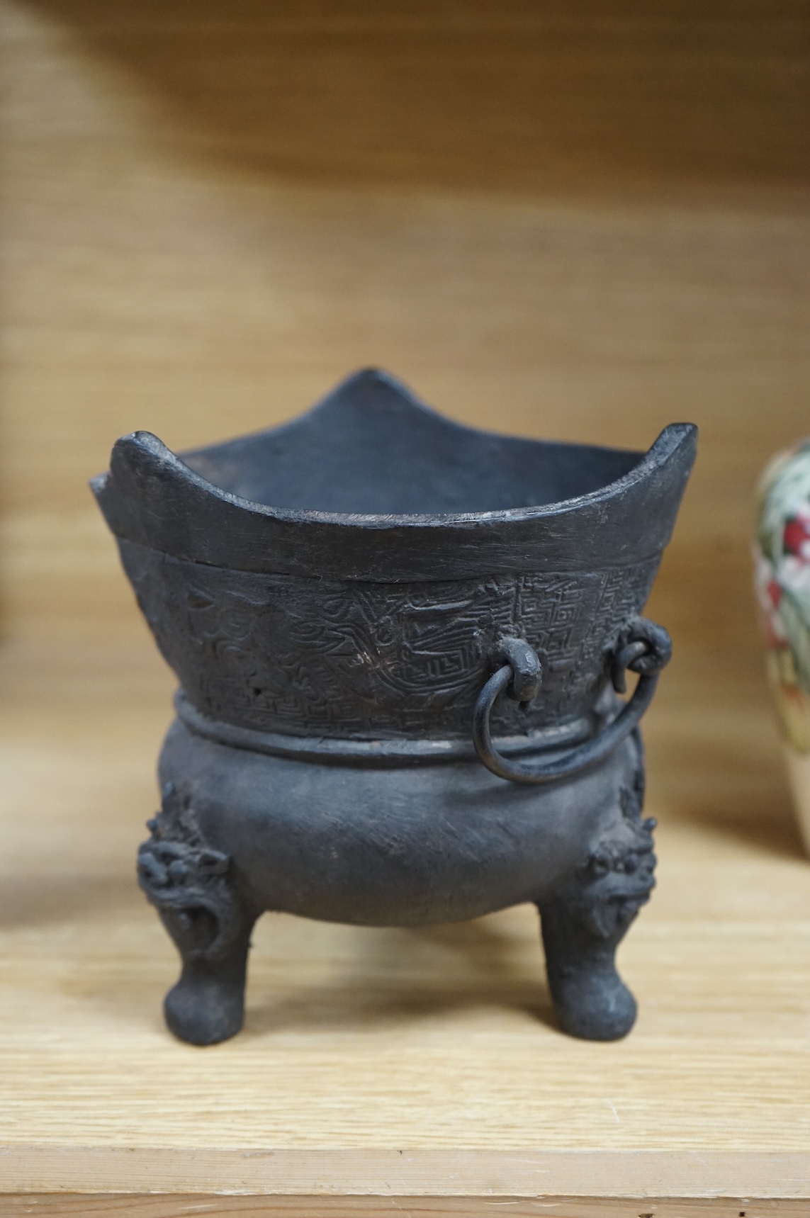 A Chinese or Japanese archaistic bronze censer, 16cm high